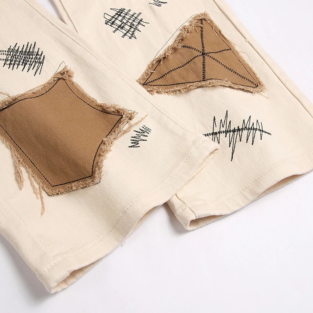 VALIFIED BRONZE GRAFFITI FLARED JEANS