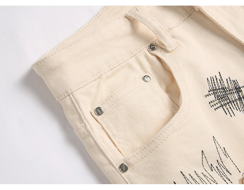 VALIFIED BRONZE GRAFFITI FLARED JEANS